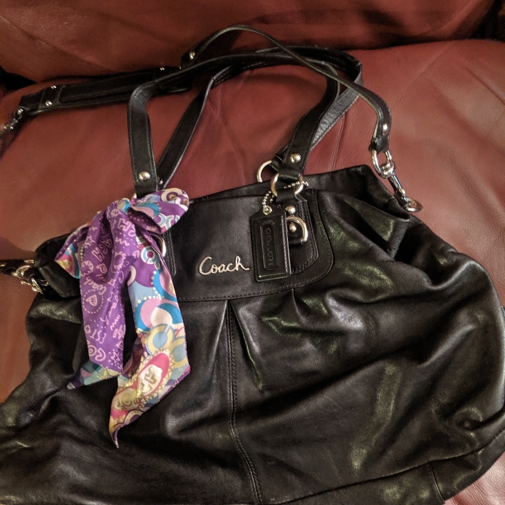 Black leather coach with scarf